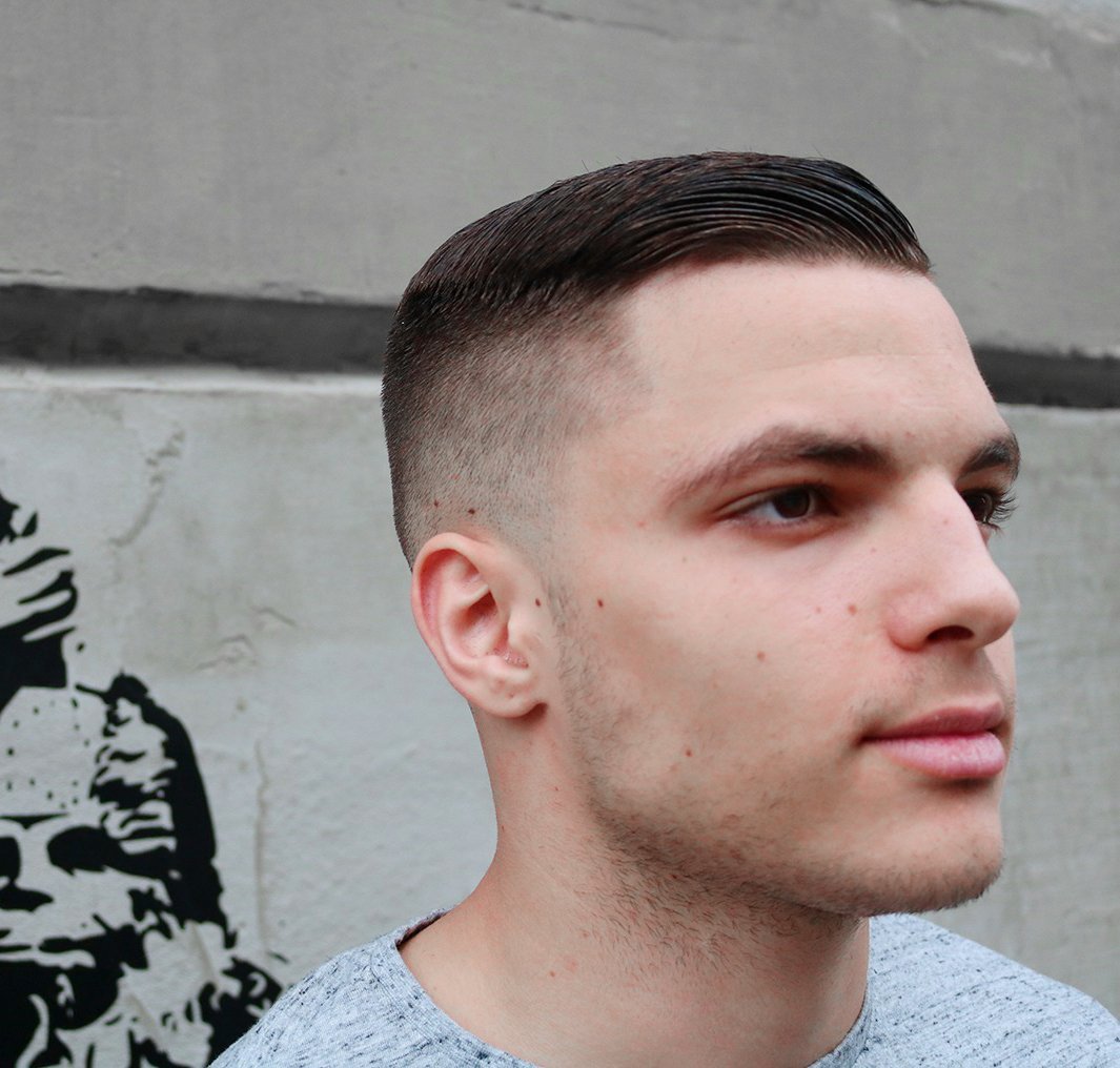Fresh fade haircut by the barber & male stylist at American Barbershop Zagreb